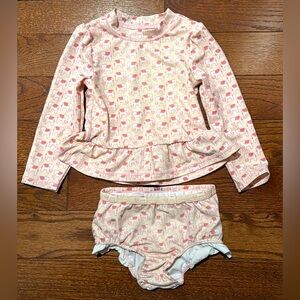 Adorable toddler, two piece rash guard swimsuit